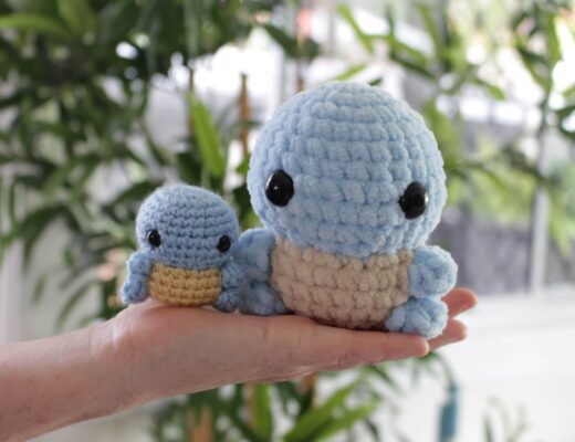 A mini low-sew squirtle made of DK yarn and a chunkier plush low-sew Squirtle made of super bulky yarn